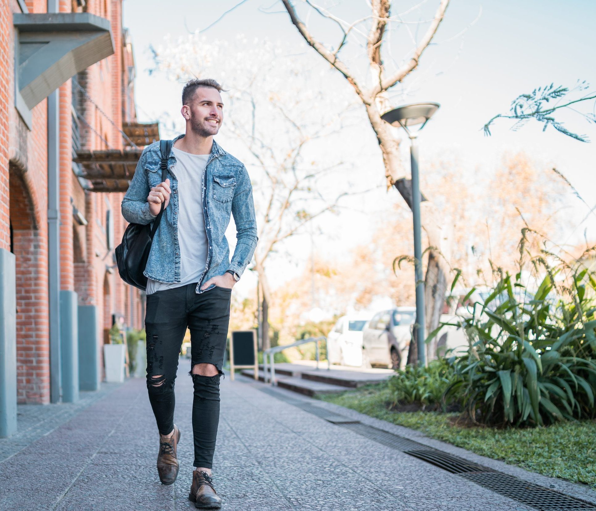 Portrait,Of,Attractive,Young,Man,Walking,On,The,Street,With